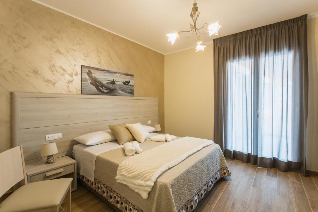 Oasi Perla Del Mare Rooms Ачи Костелло Экстерьер фото